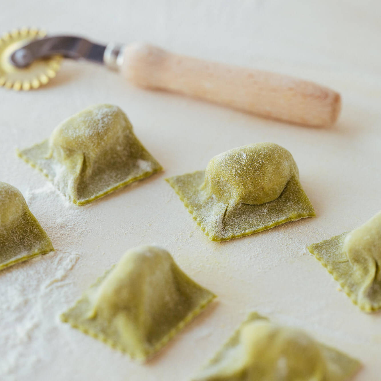 tortelli verdi di pasta fresca ripieni di spalla cotta