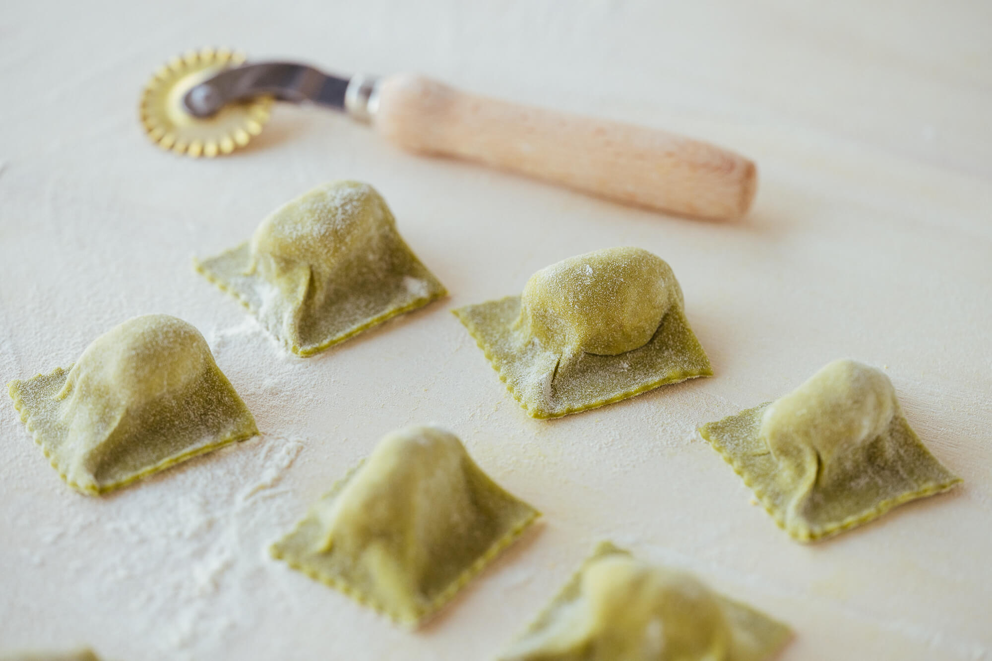 tortelli verdi di pasta fresca ripieni di spalla cotta